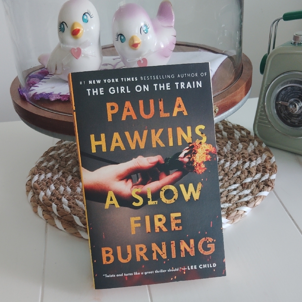 Like new- A Slow Fire Burning by Paula Hawkins